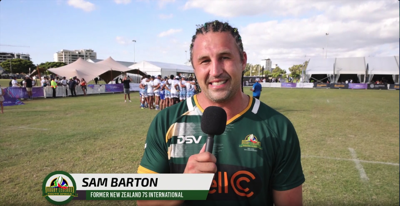 Sam Barton during a post-match interview, with an on-screen title identifying him as a former New Zealand rugby sevens international.